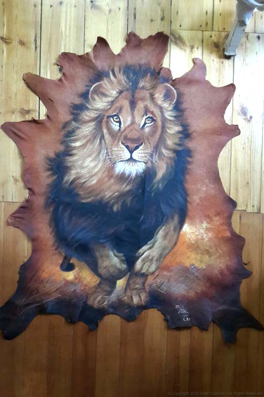 Running Lion on leather