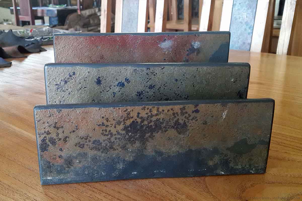 Slate made horisontal leaflet holder
