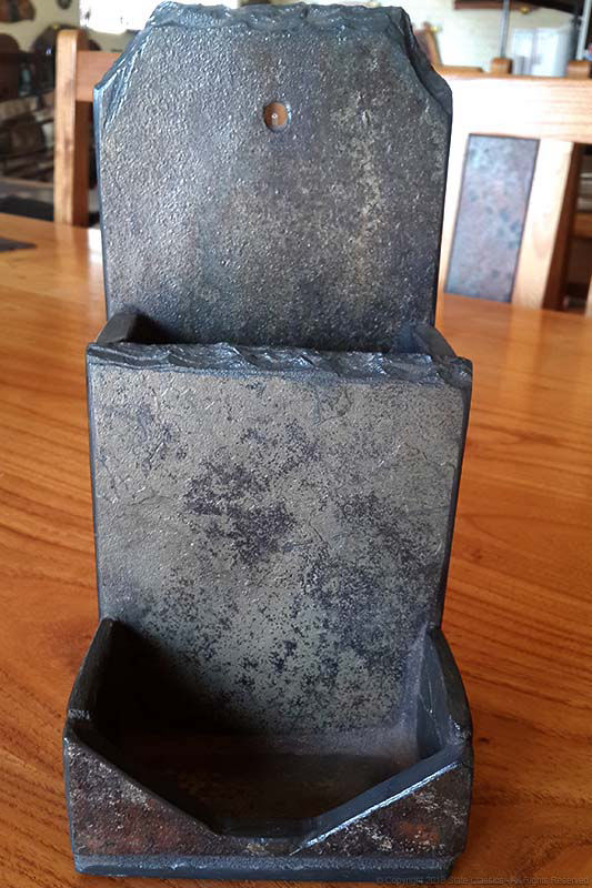 Vertical leaflet holder