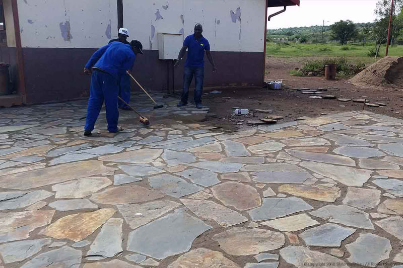 Busy laying paving