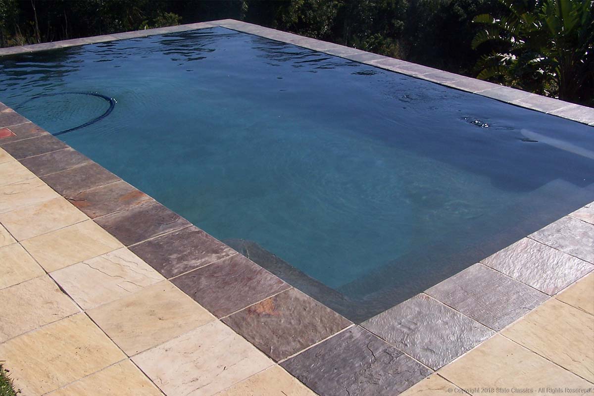 Sandstone tiles around a swimming pool